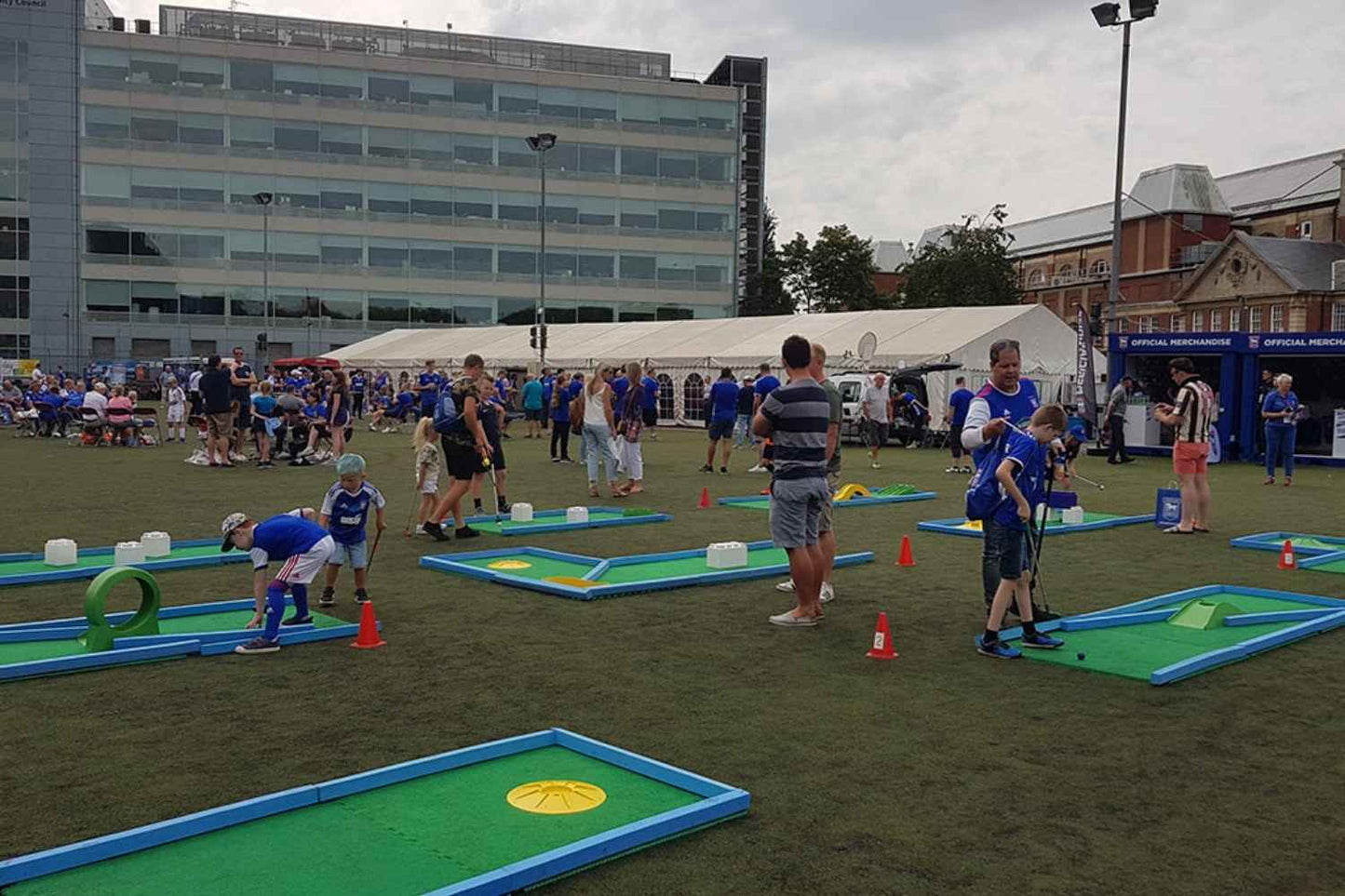 monstersize mini golf course being played by children in PE outdoors