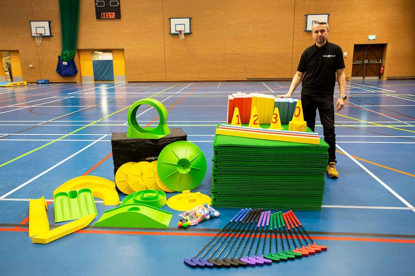 Whats included in supersize mini golf course - astro tiles, putters, balls, cones, bumpers and my mini golf obstacles