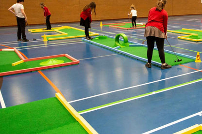 children playing on monstersize mini golf course