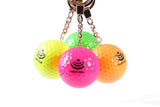 Four hanging mini golf balls in vibrant orange, pink, green, and yellow, featuring a generic logo and text of 'your logo' logo as placeholder branding