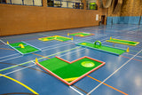 low side view of partysize mini golf course in school