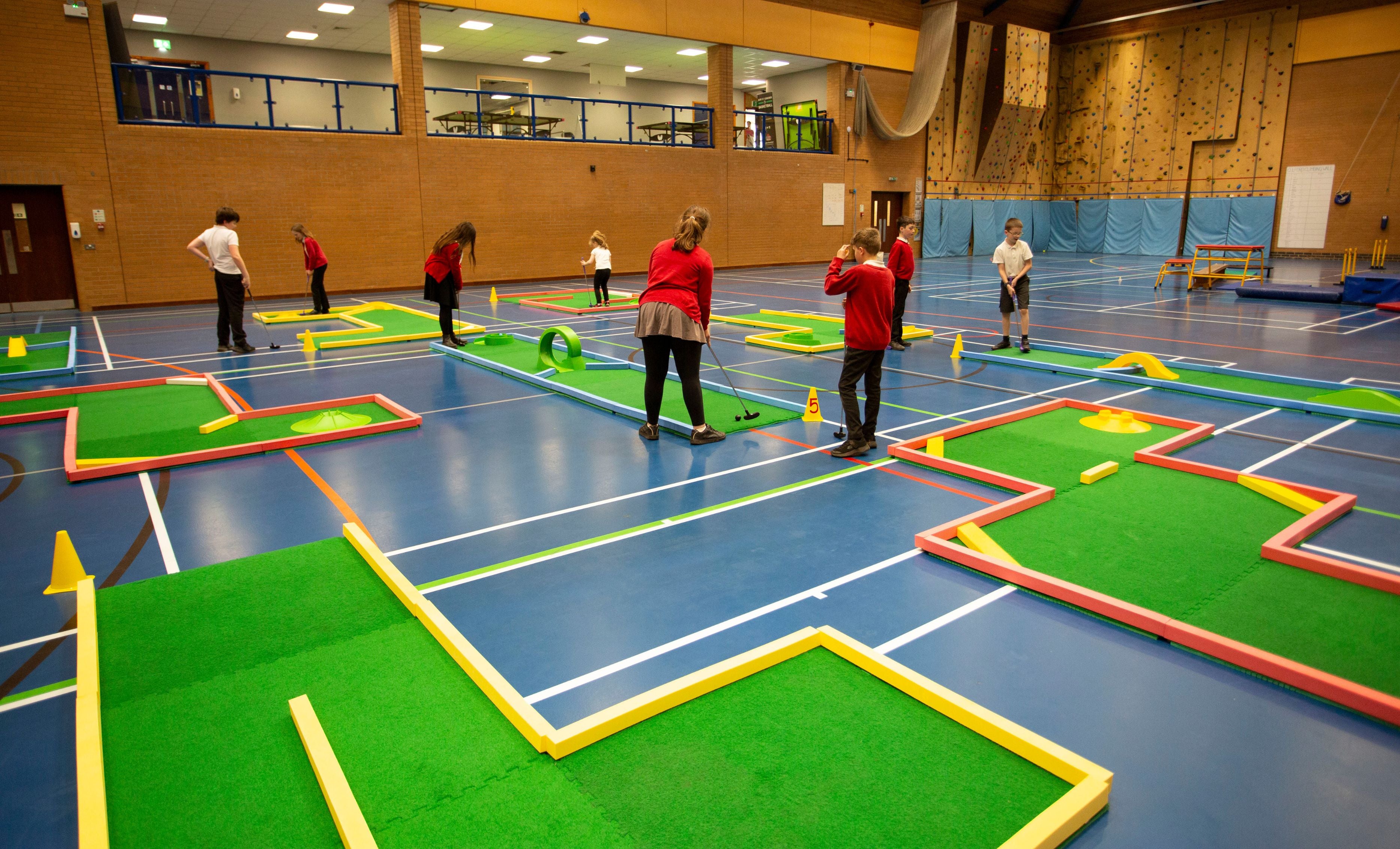 school children playing on monstersize course 